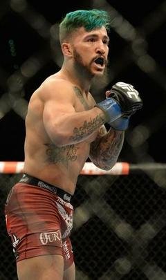 Kyogi Horiguchi (bermuda preta) venceu Louis Gaudinot por decisão unânime