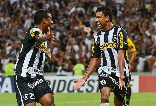 Wallyson provou que tem estrela na Copa Libertadores: ele marcou três dos quatro gols do Bota (YASUYOSHI CHIBA)