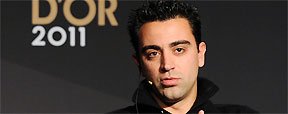 Em entrevista vazada, Xavi ataca rivais  do Real: 'N�o sabem perder' (AFP PHOTO / FRANCK FIFE )