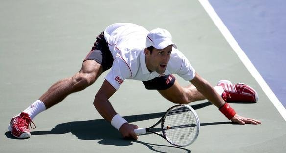Imagens do duelo entre Novak Djokovic e Stanislas Wawrinka pela semifinal do Aberto dos Estados Unidos, neste sbado