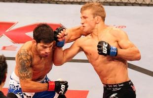 Raphael Assuno, de bermuda azul, e TJ Dillashaw, de bermuda preta