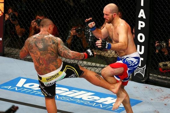 Thiago Silva, de bermuda preta, e Matt Hamill, de bermuda azul