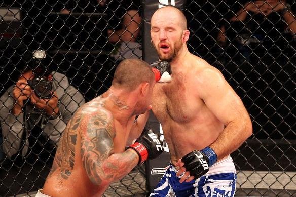 Thiago Silva, de bermuda preta, e Matt Hamill, de bermuda azul