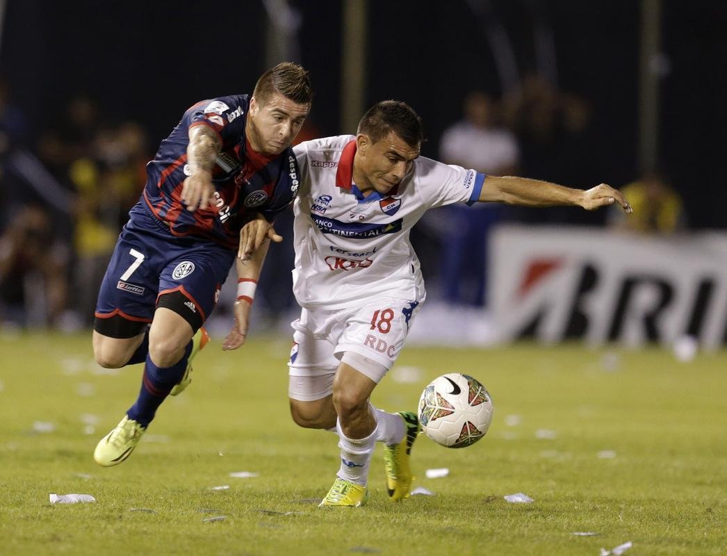 Imagens do primeiro jogo da final da Copa Libertadores 2014; empate entre Nacional e San Lorenzo