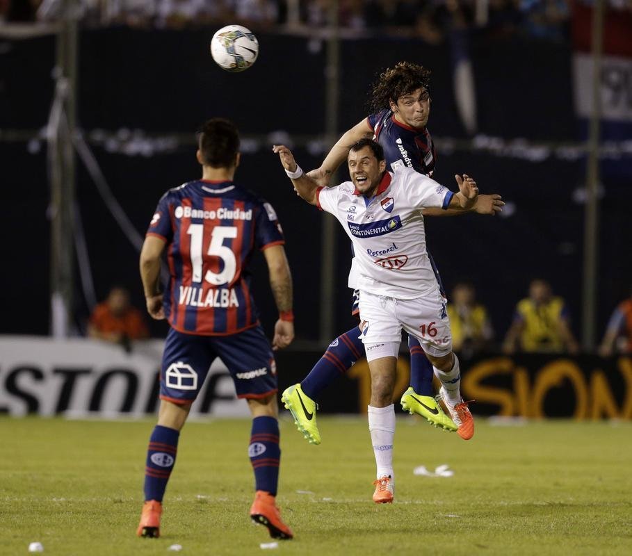 Imagens do primeiro jogo da final da Copa Libertadores 2014; empate entre Nacional e San Lorenzo
