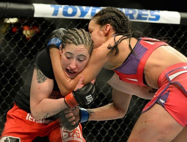 Marion Reneau (roupa vermelha) venceu Alexis Dufresne por deciso unnime