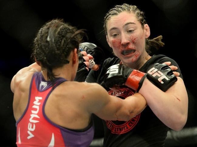 Marion Reneau (roupa vermelha) venceu Alexis Dufresne por deciso unnime