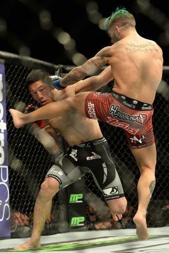  Kyogi Horiguchi (bermuda preta) venceu Louis Gaudinot por deciso unnime