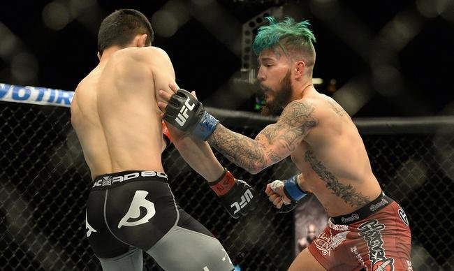  Kyogi Horiguchi (bermuda preta) venceu Louis Gaudinot por deciso unnime