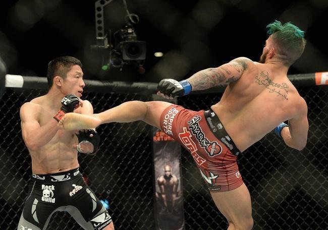  Kyogi Horiguchi (bermuda preta) venceu Louis Gaudinot por deciso unnime