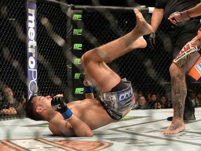 Donald Cerrone (bermuda laranja) venceu Myles Jury por deciso unnime