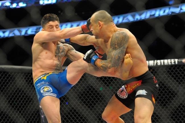 Gleison Tibau (bermuda preta) venceu Norman Parke por deciso dividida
