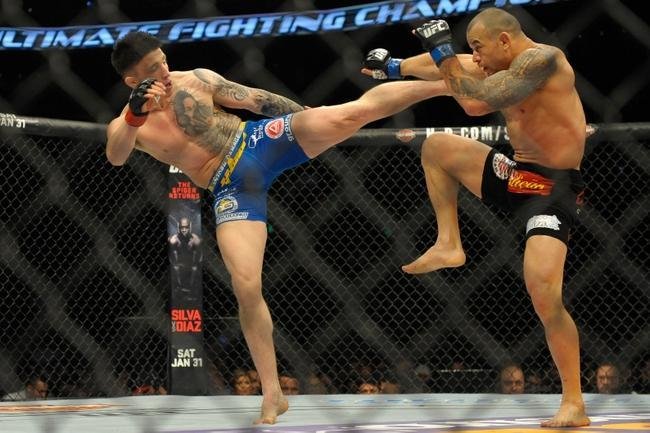 Gleison Tibau (bermuda preta) venceu Norman Parke por deciso dividida
