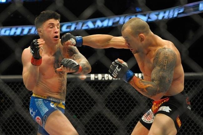 Gleison Tibau (bermuda preta) venceu Norman Parke por deciso dividida
