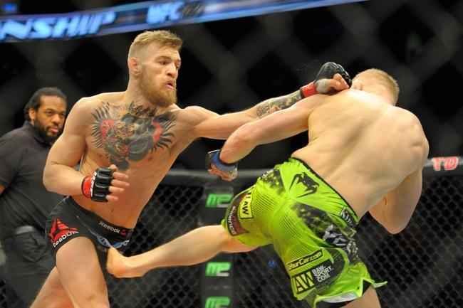 Veja imagens do novo atropelo de Conor McGregor, desta vez sobre Dennis Siver