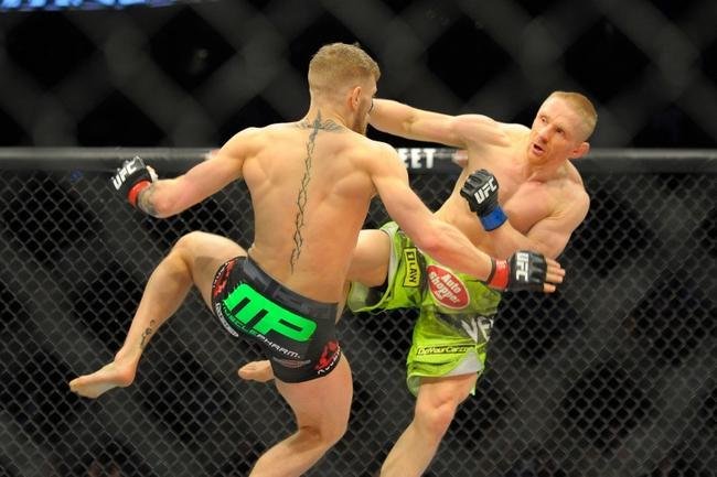 Veja imagens do novo atropelo de Conor McGregor, desta vez sobre Dennis Siver