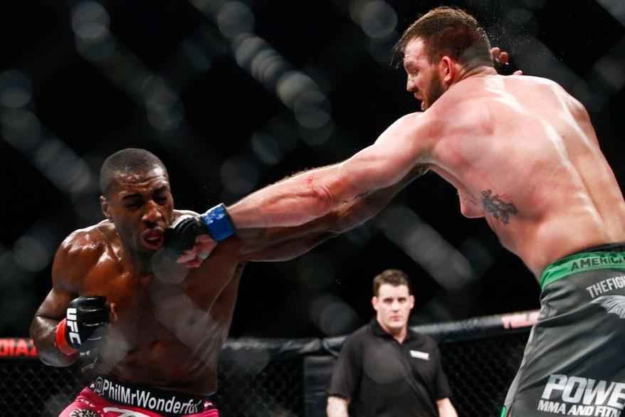 Imagens das lutas e bastidores do UFC on FOX 14, na Sucia - Ryan Bader venceu Phil Davis por deciso dividida (29-28, 28-29 e 29-28 )