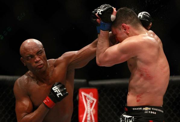 Em retorno ao octógono depois de 13 afastado por fratura na perna esquerda, Anderson Silva venceu Nick Diaz por decisão unânime, na luta principal do UFC 183, na MGM Grand Garden, em Las Vegas