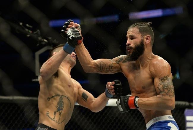 Imagens das lutas e bastidores do UFC 184, em Los Angeles - Masio Fullen (bermuda azul) venceu Alexander Torres por deciso dividida