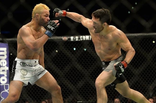 Imagens das lutas e bastidores do UFC 184, em Los Angeles - Jake Ellenberger (bermuda preta) venceu Josh Koscheck por finalizao (tringulo de mo) aos 4m20s do segundo round