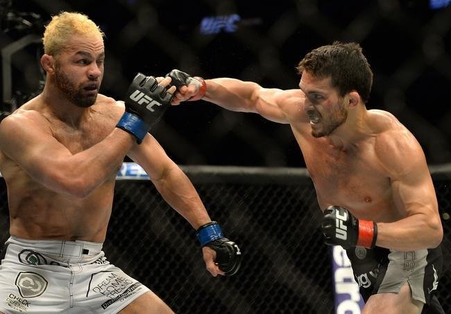 Imagens das lutas e bastidores do UFC 184, em Los Angeles - Jake Ellenberger (bermuda preta) venceu Josh Koscheck por finalizao (tringulo de mo) aos 4m20s do segundo round