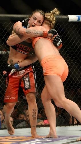 Ampla favorita, Holly Holm tem dificuldade contra Raquel Pennington, mas estreia no UFC com vitria, por deciso unnime dos juzes 