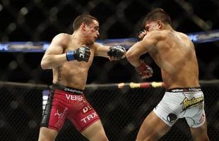 Imagens das lutas e bastidores do UFC 185, em Dallas - Ryan Benoit (bermuda rosa) venceu Sergio Pettis por nocaute tcnico no segundo round