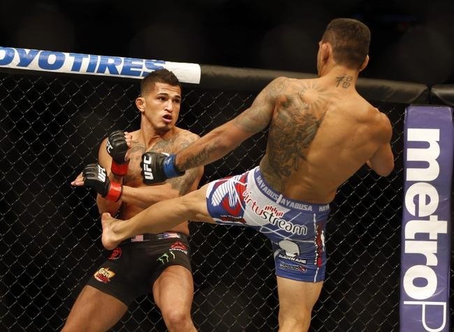 Fotos da vitria de Rafael dos Anjos, que valeu o cinturo dos leves do UFC
