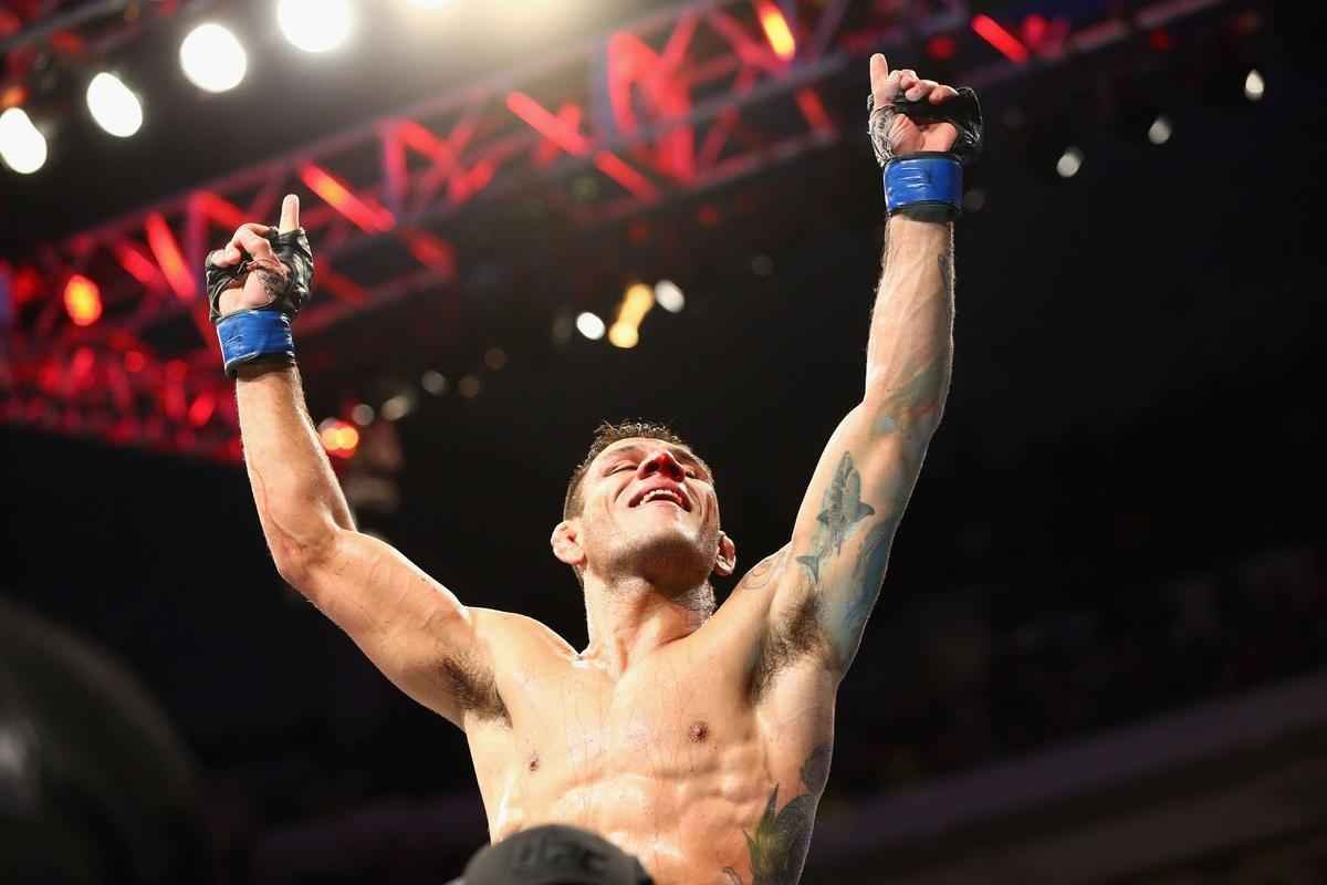 Fotos da vitria de Rafael dos Anjos, que valeu o cinturo dos leves do UFC