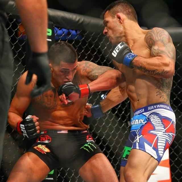 Fotos da vitria de Rafael dos Anjos, que valeu o cinturo dos leves do UFC