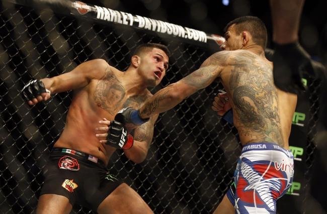 Fotos da vitria de Rafael dos Anjos, que valeu o cinturo dos leves do UFC