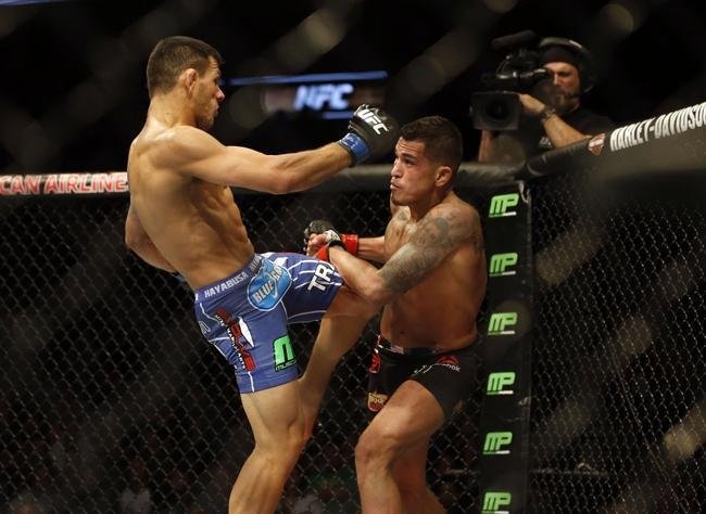 Fotos da vitria de Rafael dos Anjos, que valeu o cinturo dos leves do UFC