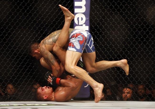 Fotos da vitria de Rafael dos Anjos, que valeu o cinturo dos leves do UFC