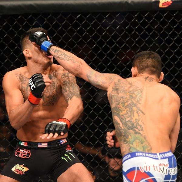Fotos da vitria de Rafael dos Anjos, que valeu o cinturo dos leves do UFC