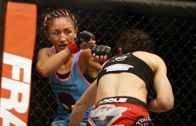 Imagens da vitria de Joanna Jedrzejczyk, que conquistou o cinturo peso palha do UFC