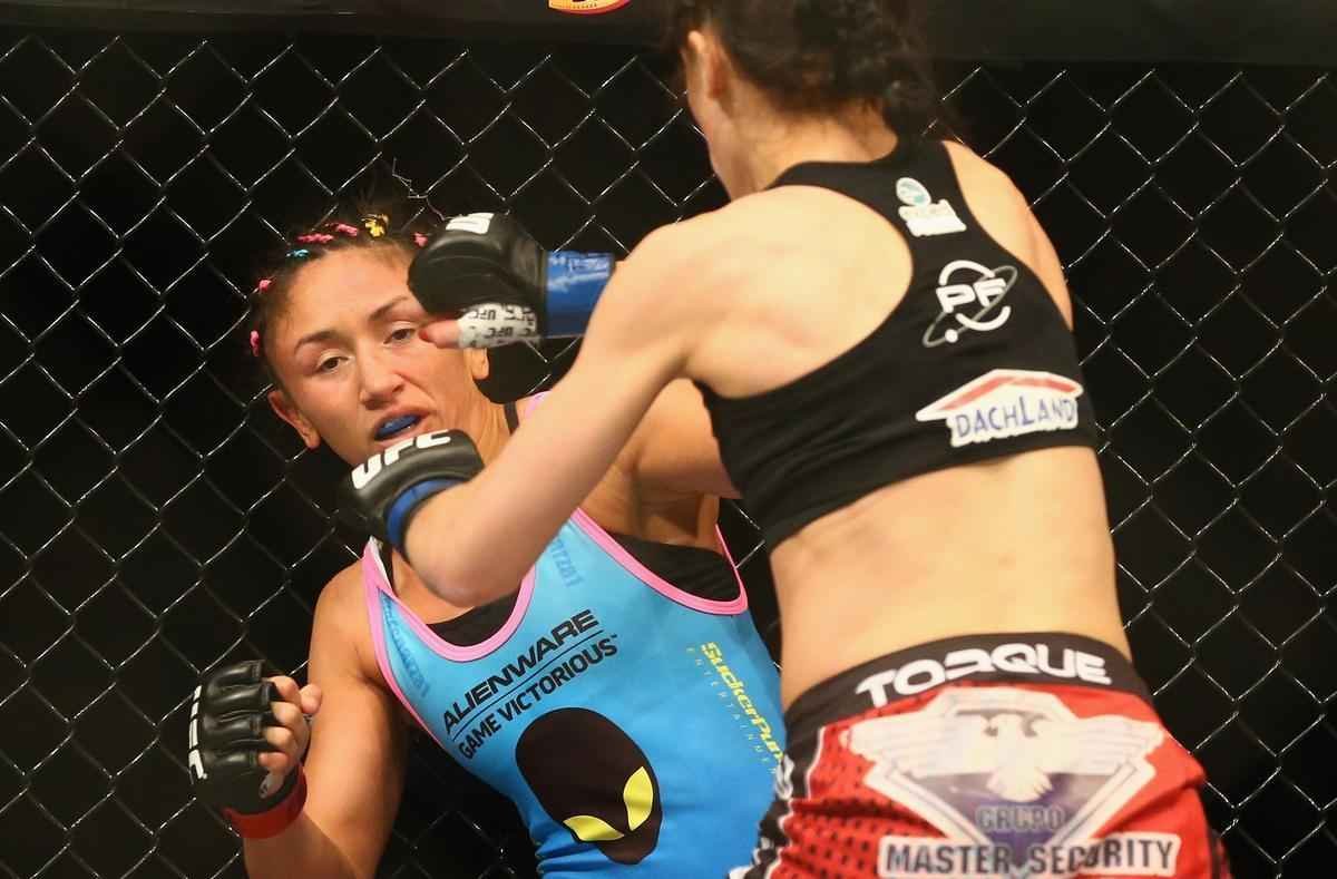 Imagens da vitria de Joanna Jedrzejczyk, que conquistou o cinturo peso palha do UFC