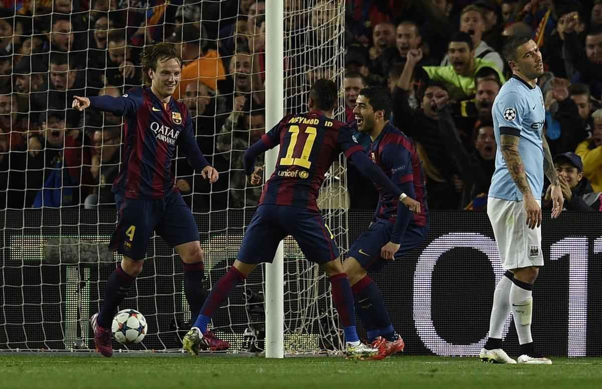 Imagens do duelo entre Barcelona e Manchester City, no Camp Nou, pela Liga dos Campees