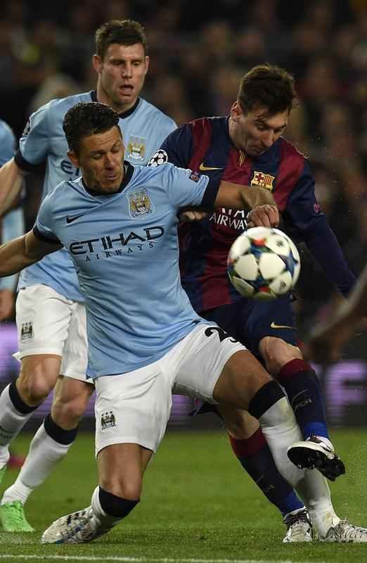 Imagens do duelo entre Barcelona e Manchester City, no Camp Nou, pela Liga dos Campees