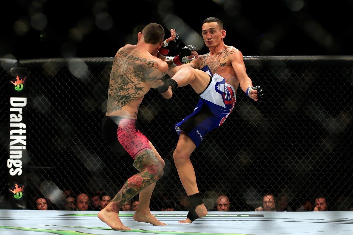 Imagens das lutas e dos bastidores do UFC on FOX 15, em Newark - Max Holloway venceu Cub Swanson por finalizao a 3min58seg do terceiro round