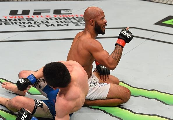 Demetrious Johnson vence Kyoji Horiguchi por finalizao, com armlock a apenas um segundo para fim da luta em Montreal, e mantm o cinturo dos moscas 