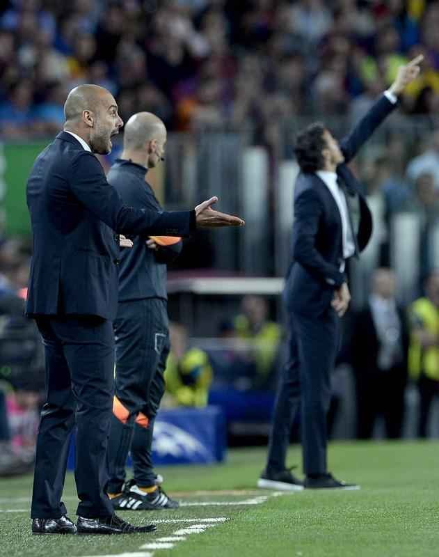 Reaes dos tcnicos a lances da partida entre Barcelona e Bayern de Munique