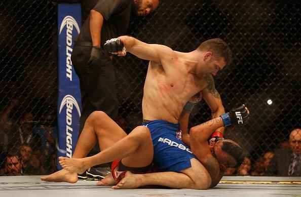 Chris Weidman venceu Vitor Belfort por nocaute tcnico na terceira defesa de cinturo do peso mdio, no UFC 187, em maio deste ano