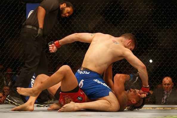 Chris Weidman venceu Vitor Belfort por nocaute tcnico na terceira defesa de cinturo do peso mdio, no UFC 187, em maio deste ano