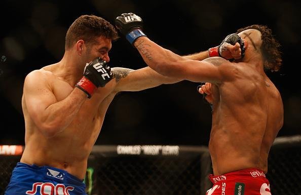Veja fotos da vitória de Chris Weidman sobre Vitor Belfort no UFC 187