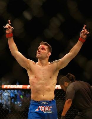 Veja fotos da vitória de Chris Weidman sobre Vitor Belfort no UFC 187