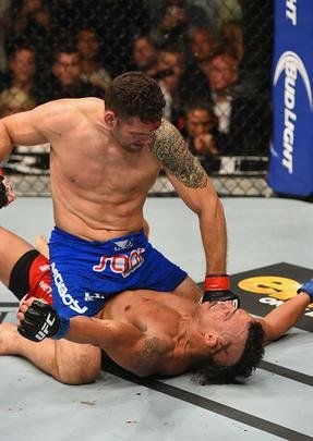 Veja fotos da vitória de Chris Weidman sobre Vitor Belfort no UFC 187