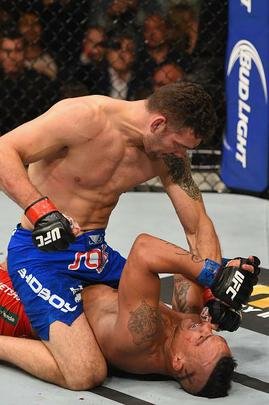 Veja fotos da vitória de Chris Weidman sobre Vitor Belfort no UFC 187