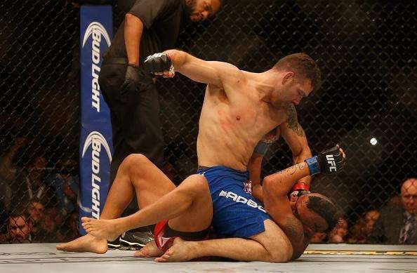 Veja fotos da vitória de Chris Weidman sobre Vitor Belfort no UFC 187