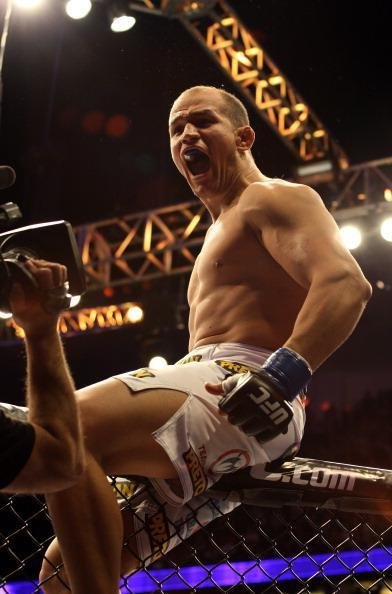 Na primeira defesa de cinturo, Velasquez conheceu a nica derrota de sua carreira. O norte-americano enfrentou o brasileiro Junior Cigano dos Santos e foi nocauteado com pouco mais de um minuto depois de levar um knockdown e uma sequncia de golpes no cho