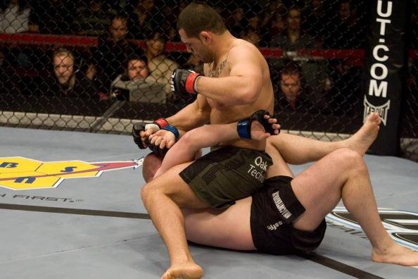 Em sua terceira luta como profissional, em abril de 2008, Cain Velasquez estreou no UFC. Em Montreal, ele precisou de apenas dois minutos para nocautear o australiano Brad Morris